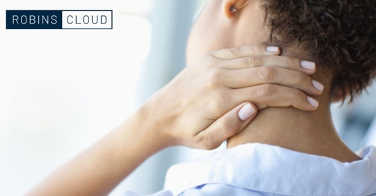 Woman with neck pain after a car accident a few days ago