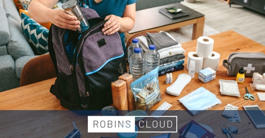 Person prepping an emergency kit