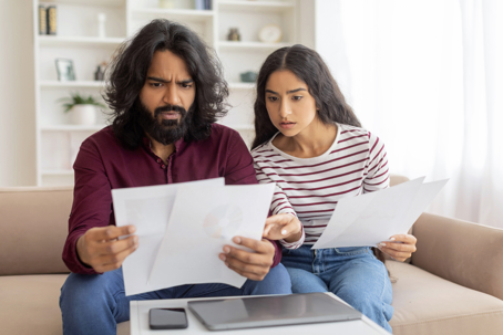 Couple looking over forms